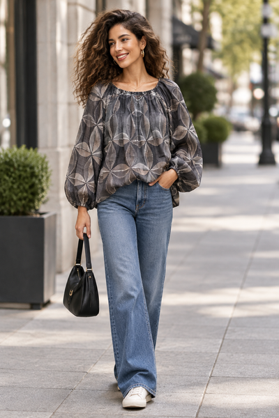 Black print blouse on female model