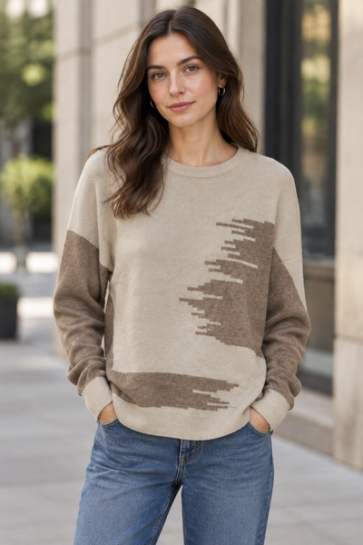 Female model wearing the beige long-sleeve two-tone sweater