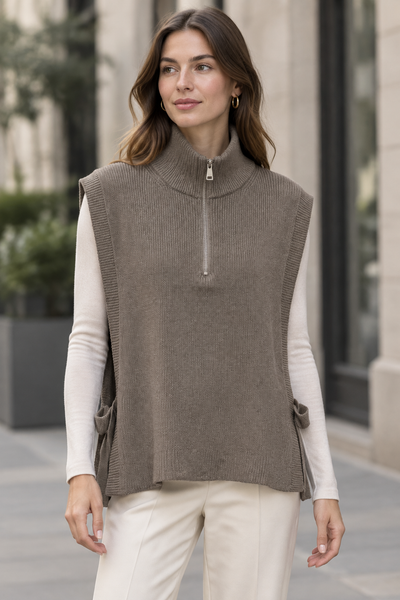 Female model wearing the taupe side-open knit vest