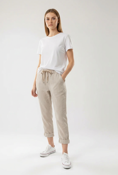 Stone drawstring pants on a female model