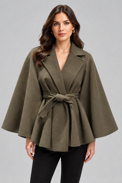 Female model wearing a short khaki green belted cape coat