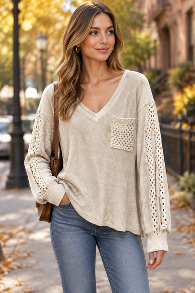 Female model wearing the beige Detail Sleeve Sweater