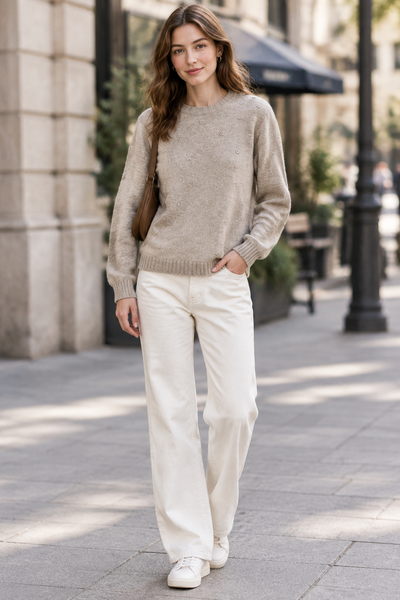 Female model wearing the Detail Front Sweater
