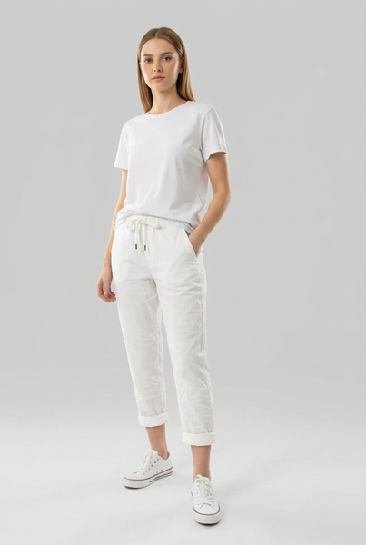 White drawstring pants on a female model