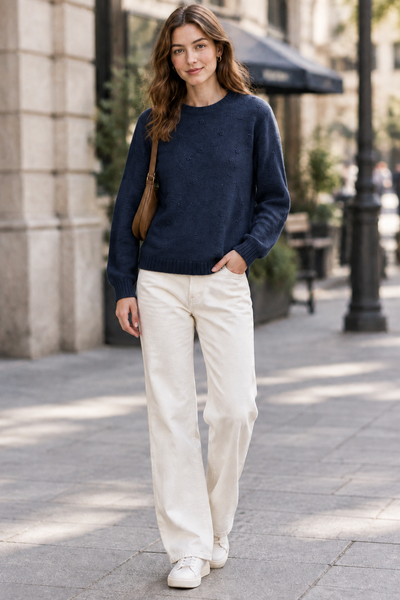 Female model wearing the Detail Front Sweater in navy