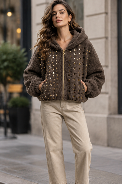 Female model wearing the brown stud-front hooded jacket